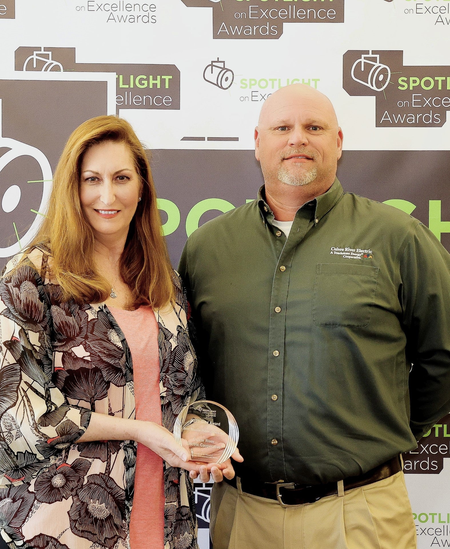 From left, Mary Wilson, CREC’s Vice President of Strategic Communications, and Gabe Twellman, CREC Member Services Representative, were on hand to receive the co-op’s Spotlight on Excellence award in Jacksonville, Fla., this May