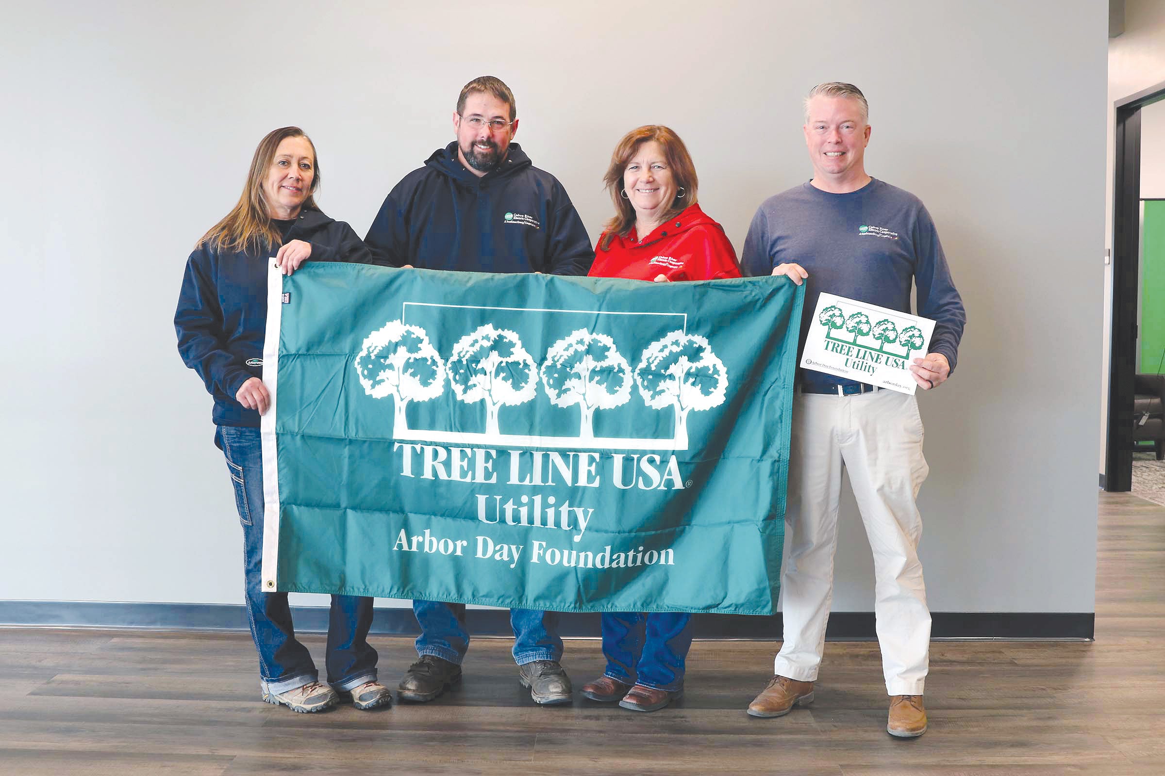 Cuivre River Electric Cooperative's Right-of-Way Department celebrates its 21st year being named a Tree Line USA Utility by the Arbor Day Foundation. Pictured from left are Tina Brocke, Benjamin Voss, Patty Williams, and Scott Skopec.